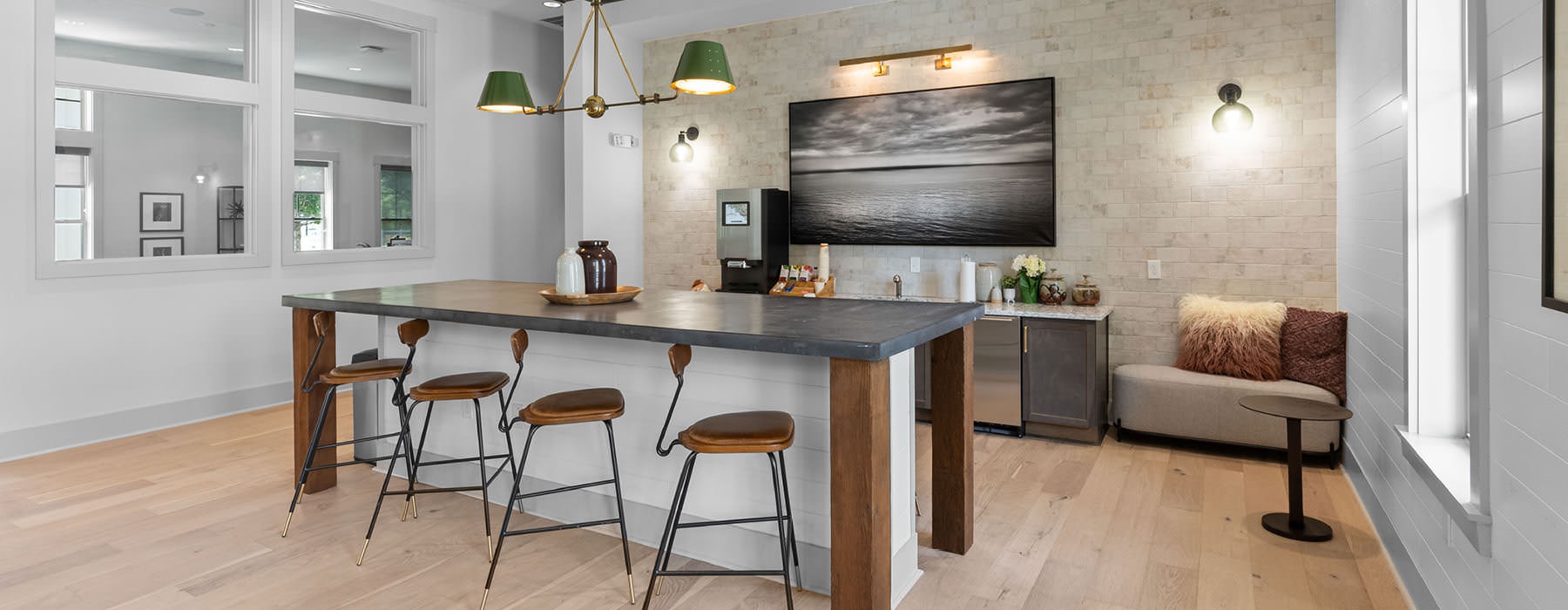 kitchen with island seating in clubhouse